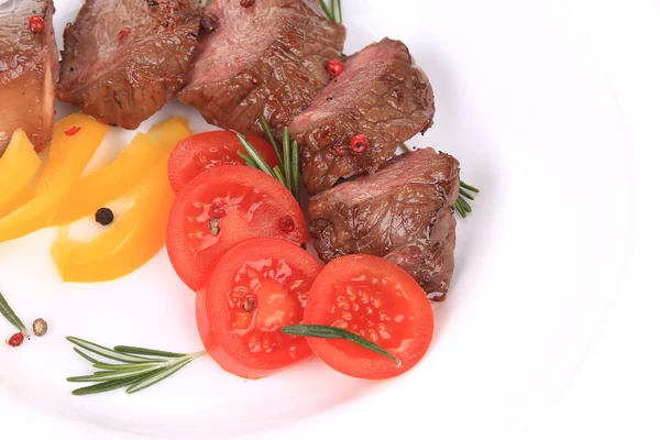 Rindersteaks mit Tomaten und Rosmarin. — Stockfoto