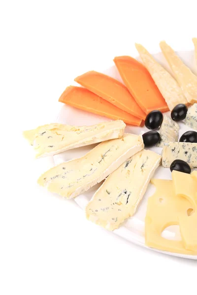 Cheeseboard with black olives. — Stock Photo, Image
