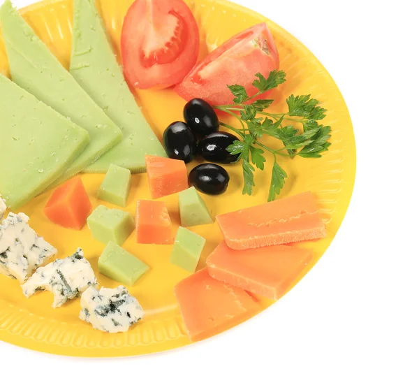 Cheeses and vegetables. — Stock Photo, Image