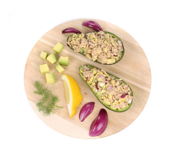 Avocado salad with tuna on platter. — Stock Photo, Image