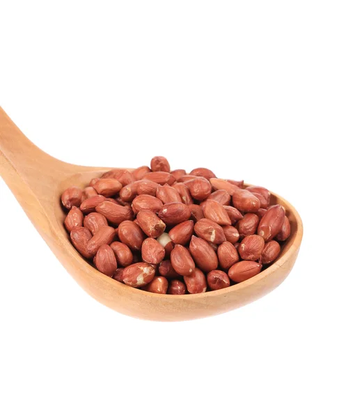 Wooden spoon with peanuts. — Stock Photo, Image