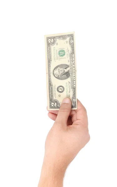 Ruka držící dva dolarové bankovky. — Stock fotografie