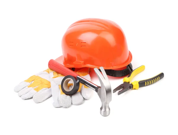 Hard hat, hammer, pliers and work gloves. — Stock Photo, Image