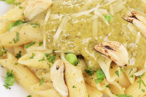 Pasta penne with sauce pesto and parmesan. — Stock Photo, Image