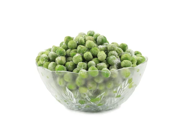 Green frozen peas in a glass dish. — Stock Photo, Image