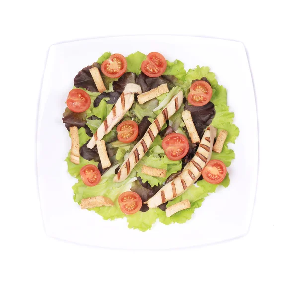 Tallrik med grönsaker för caesar sallad. — Stockfoto