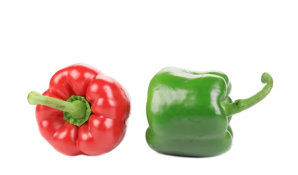 Two red and green peppers close up. — Stock Photo, Image