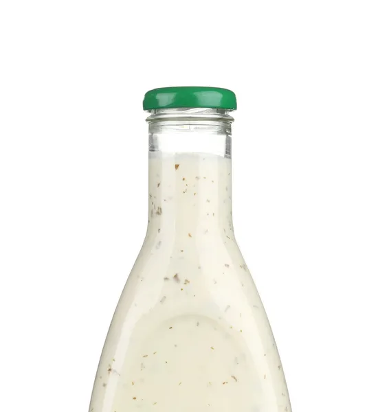 Glasflasche mit weißer Sauce. — Stockfoto