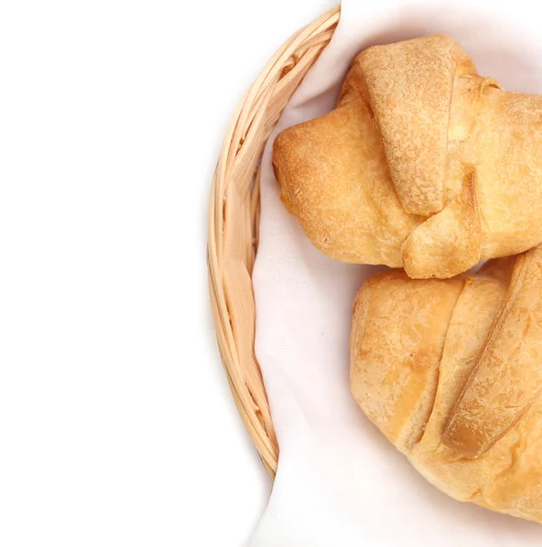 Croissants or crescent rolls in basket. — Stock Photo, Image