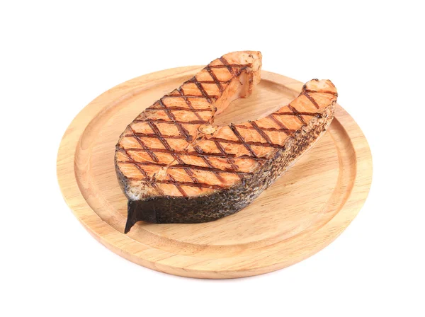 Grilled salmon steak on platter. — Stock Photo, Image