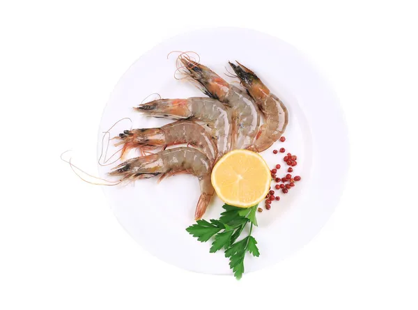 Raw shrimps on plate. — Stock Photo, Image