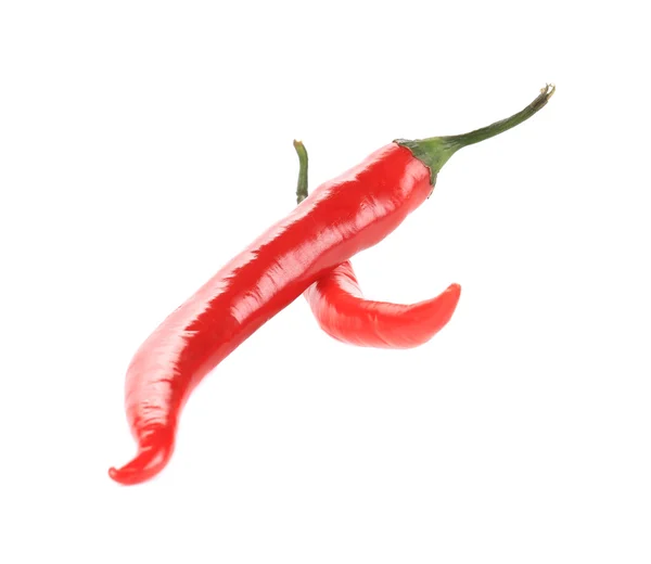 Dvě červené chilli papričky. — Stock fotografie