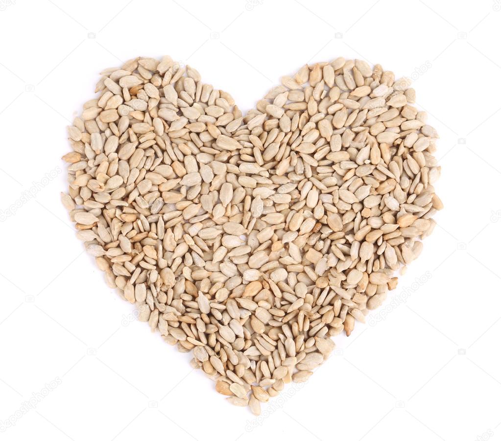 Heart shape of pelled sunflower seeds.