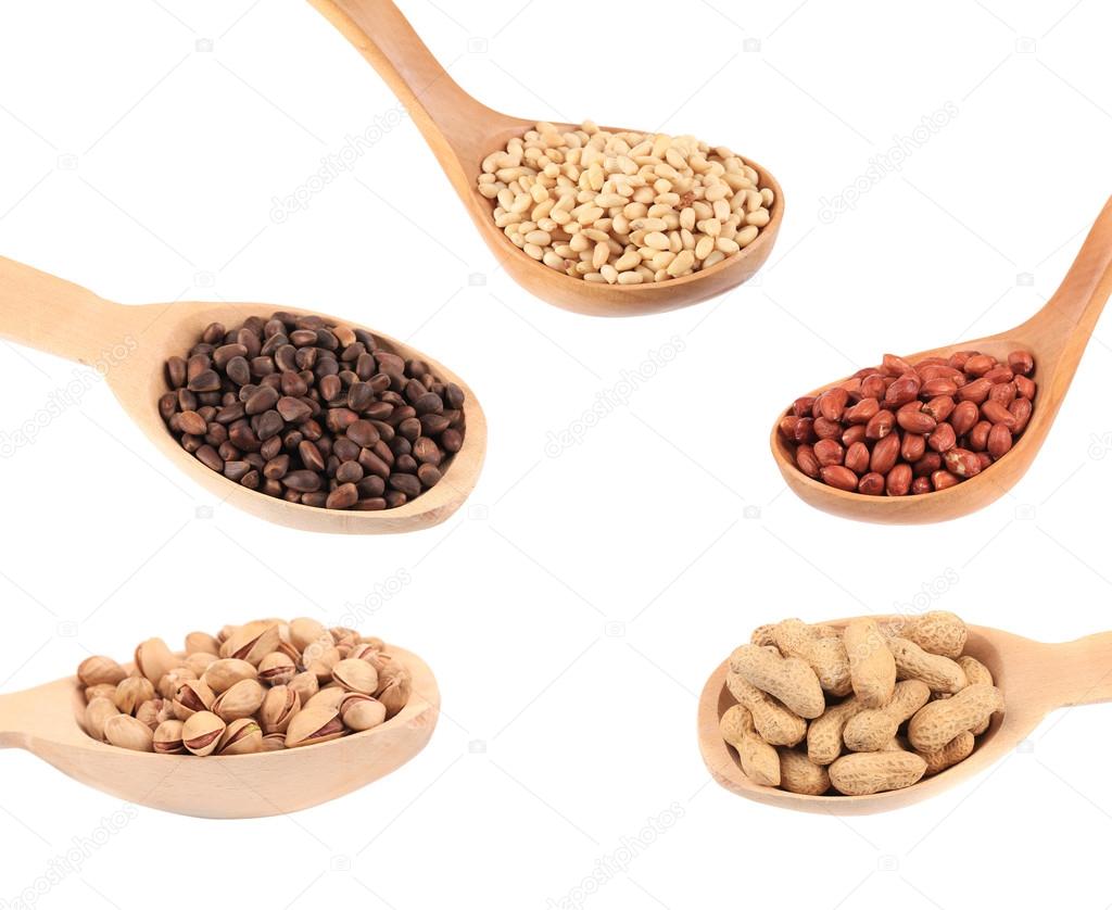Collage of different nuts in spoons.