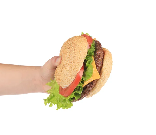 La mano sostiene hamburguesa fresca . —  Fotos de Stock