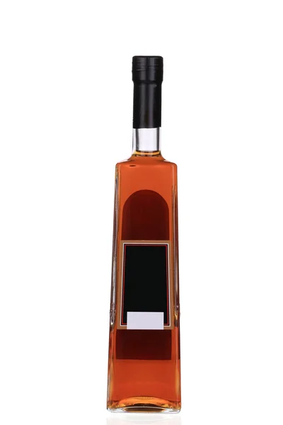 Cognac fles op witte achtergrond. — Stockfoto