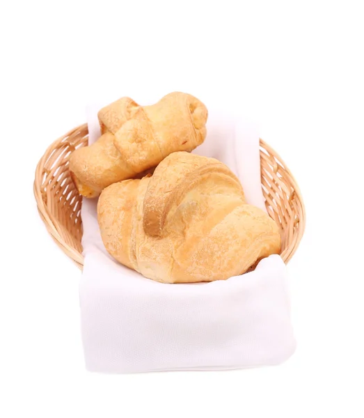 Croissants or crescent rolls in basket. — Stock Photo, Image
