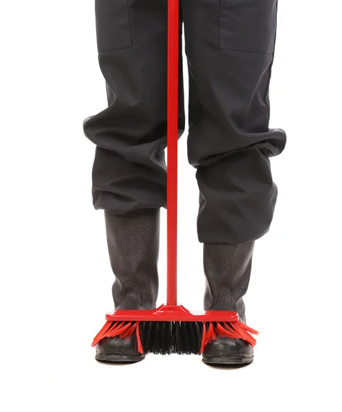 Legs and red mop. — Stock Photo, Image