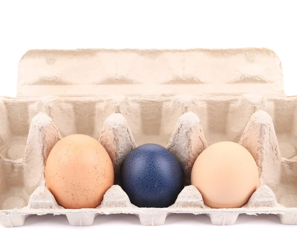 Eggs and egg carton. — Stock Photo, Image