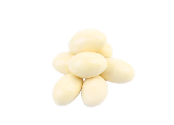 Pill of white chocolate dragee. — Stock Photo, Image