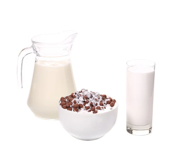 Müsli in Schüssel und Glas mit Milch. — Stockfoto