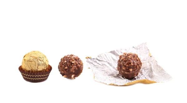 Three in row chocolate bonbons. — Stock Photo, Image