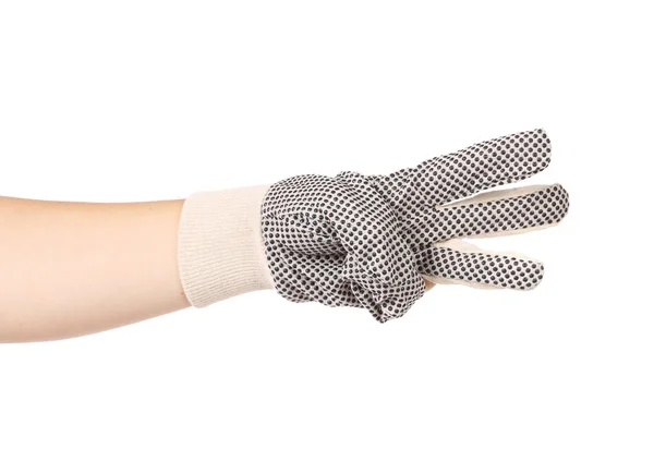 Hand in handschoenen toont er drie. — Stockfoto