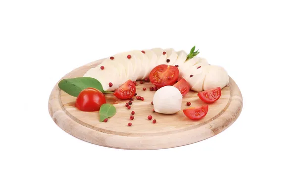 Tomatoes and mozzarella balls. — Stock Photo, Image