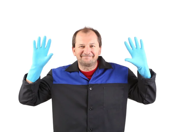 Hombre en ropa de trabajo mostrando las palmas . — Foto de Stock