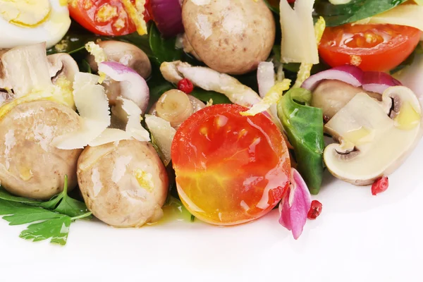 Mushroom salad with tomatoes and quail eggs. — Stock Photo, Image