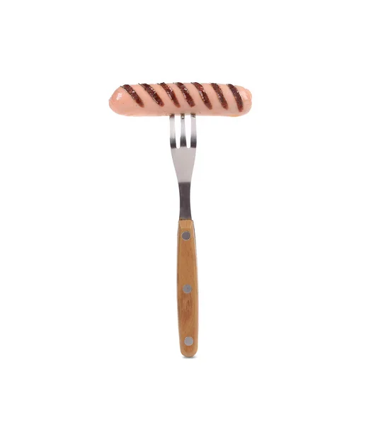 Grilled sausage on a fork. — Stock Photo, Image