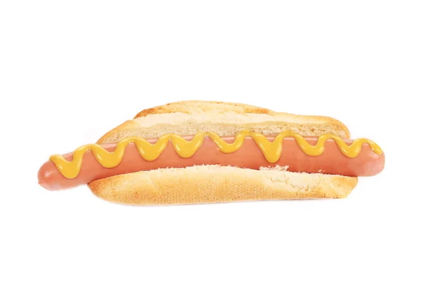 Grote smakelijke hotdog met mosterd. — Stockfoto