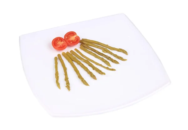 Groene asperges en tomaten in blik. — Stockfoto