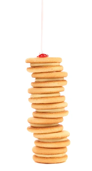 Stack of biscuits with pouring syrup. — Stock Photo, Image