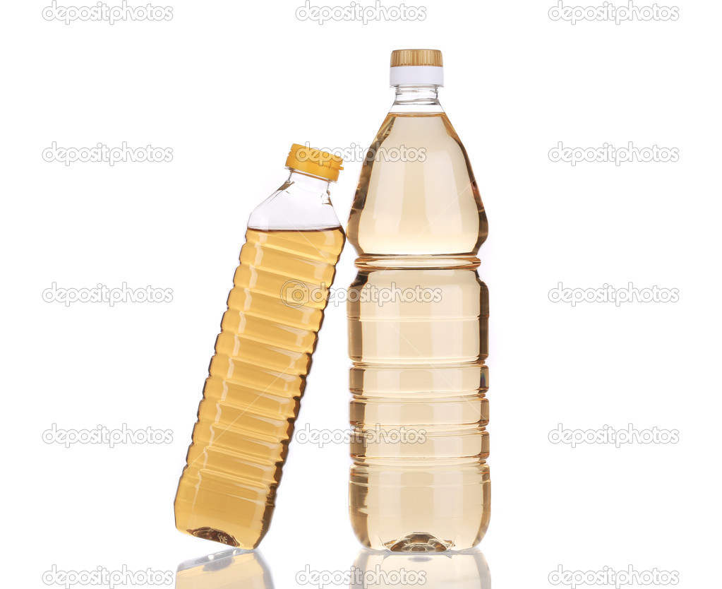 Two bottles of vinegar.