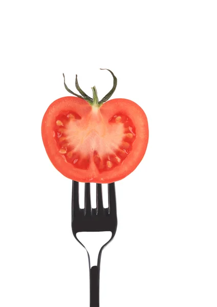 Czerwony soczystych pomidorów na widelec. — Zdjęcie stockowe