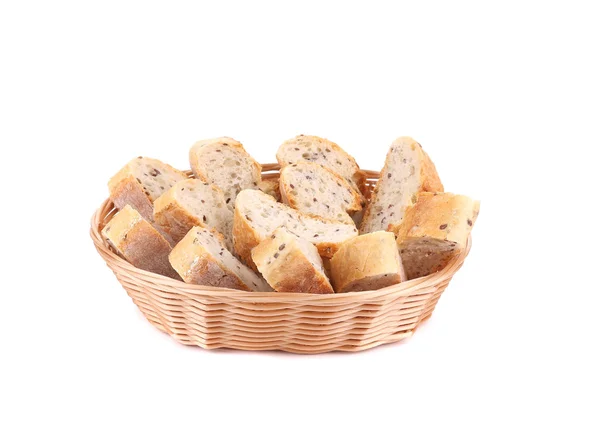 Sliced baguette on wicker basket. — Stock Photo, Image