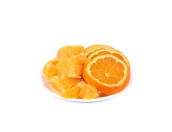 Verse plakjes van Oranje op plaat. — Stockfoto