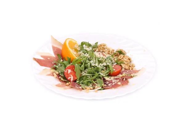 Salad with arugula and prosciutto. — Stock Photo, Image