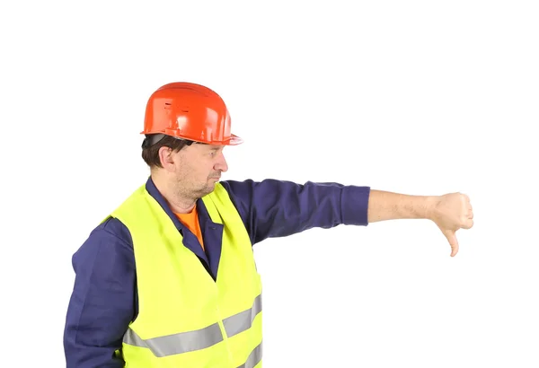 Trabalhador em chapéu duro com o polegar para baixo . — Fotografia de Stock