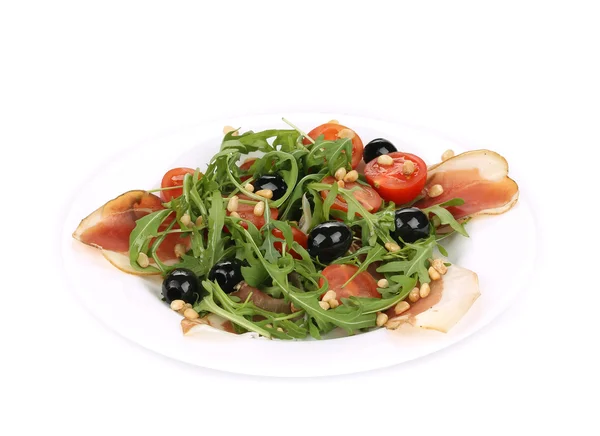 Salada com rúcula e presunto . — Fotografia de Stock
