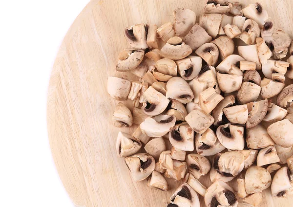 Mushrooms on wooden platter. — Stock Photo, Image