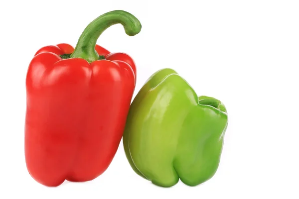 Two red and green sweet bell peppers. — Stock Photo, Image