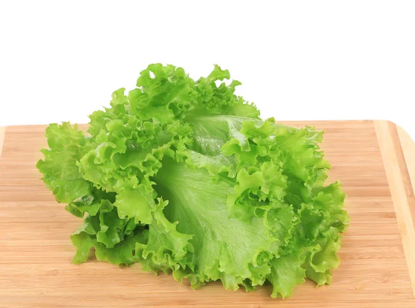 Fresh lettuce on wooden platter. — Stock Photo, Image