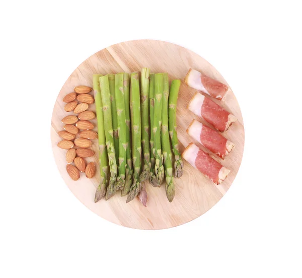 Platter with asparagus and prosciutto. — Stock Photo, Image