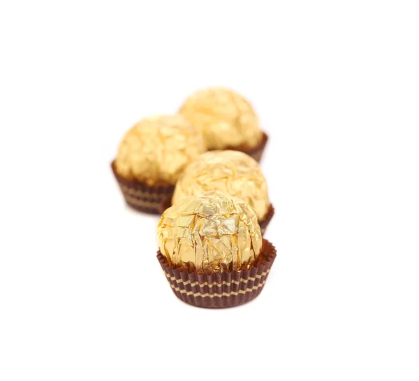 Gold chocolate bonbons. — Stock Photo, Image