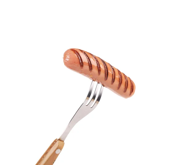 Grillwurst auf der Gabel. — Stockfoto