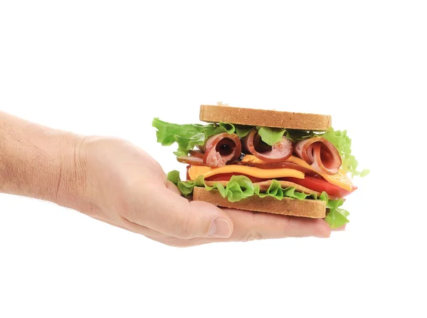 Hand innehar franska toast smörgås. — Stockfoto