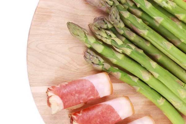 Platter with asparagus and prosciutto. — Stock Photo, Image