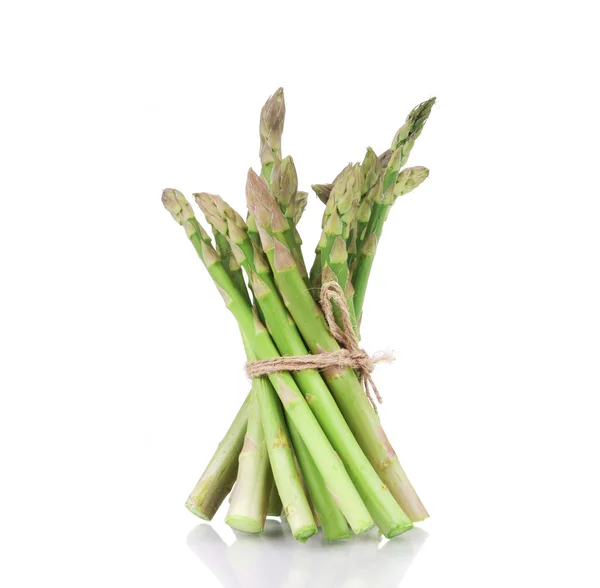 Asperges gebonden op de witte achtergrond. — Stockfoto